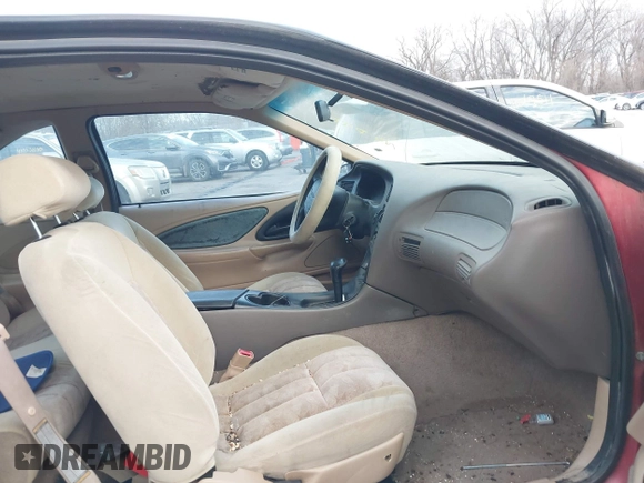 1997 Ford Thunderbird LX z VIN 1FALP62W8VH161871, wystawiony jako IAAI lot #41018103 z przebiegiem 138 915 mil mil oraz . Historia ofert i sprzedaży dostępna na DreamBid. Obrazek 5.