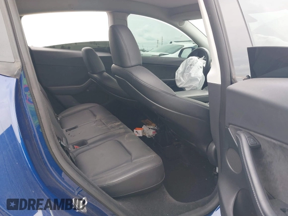 2022 Tesla Model Y Long Range z VIN 7SAYGDEE9NA002493, wystawiony jako IAAI lot #41756460 z przebiegiem 68 315 mil mil oraz . Historia ofert i sprzedaży dostępna na DreamBid. Obrazek 8.