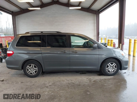 2007 Honda Odyssey EX with VIN 5FNRL38417B054717, listed as a IAAI auction lot 41955733 with 157,076 mi miles. Bid and sale history available at carsss.com. Image 13.