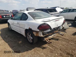1999 Pontiac Grand Am GT with VIN 1G2NW12E0XM853038, listed as a Copart auction lot 69262194 with 162,986 mi miles and Salvage Title. Bid and sale history available at carsss.com. Image 2.