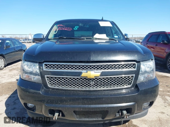 2013 Chevrolet Tahoe LTZ with VIN 1GNSKCE0XDR350970, listed as a IAAI auction lot 41704253 with 126,653 mi miles and . Bid and sale history available at DreamBid. Image 13.