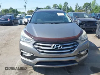 2017 Hyundai Santa Fe Sport 2.4L with VIN 5NMZU3LB9HH001167, listed as a IAAI auction lot 42061866 with 144,441 mi miles. Bid and sale history available at carsss.com. Image 6.