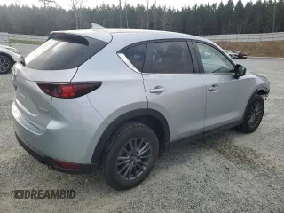 2021 Mazda CX-5 Touring with VIN JM3KFACM2M0451083, listed as a Copart auction lot 49999935 with 59,927 mi miles and Salvage Title. Bid and sale history available at carsss.com. Image 3.