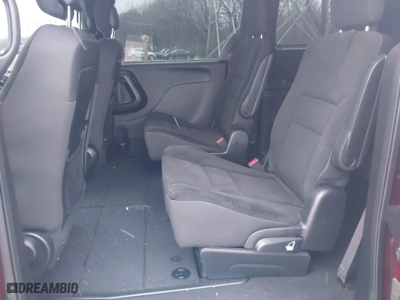 2019 Dodge Grand Caravan SE with VIN 2C4RDGBG1KR521851, listed as a IAAI auction lot 41572267 with 104,484 mi miles. Bid and sale history available at carsss.com. Image 8.