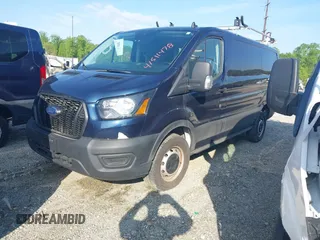 2023 Ford Transit Cargo with VIN 1FTBR1Y84PKB55342, listed as a IAAI auction lot 41511478 with 27,688 mi miles and . Bid and sale history available at DreamBid. Image 2.