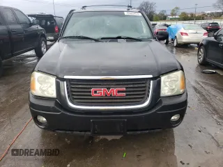 2004 GMC Envoy SLT with VIN 1GKDT13S042310076, listed as a Copart auction lot 79965854 with 220,506 mi miles and Salvage Title. Bid and sale history available at carsss.com. Image 5.