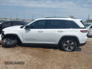 2023 Jeep Grand Cherokee with VIN 1C4RJYB63PC649000, listed as a IAAI auction lot 42306975 with 29,948 mi miles and . Bid and sale history available at DreamBid. Image 14.