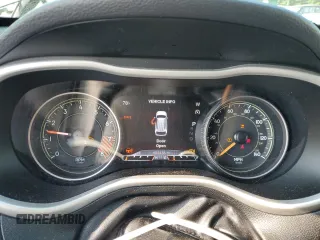 2015 Jeep Cherokee Trailhawk z VIN 1C4PJMBS2FW705132, wystawiony jako Copart lot #59884325 z przebiegiem 100 438 mil mil oraz Szkoda całkowita • Salvage title. Historia ofert i sprzedaży dostępna na DreamBid. Obrazek 9.