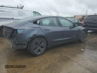 2023 Tesla Model 3 z VIN 5YJ3E1EA9PF699744, wystawiony jako Copart lot #56407215 z przebiegiem 5 201 mil mil oraz Szkoda całkowita • Salvage title. Historia ofert i sprzedaży dostępna na DreamBid. Obrazek 3.