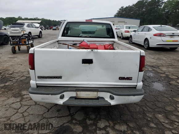 1998 GMC Sonoma z VIN 1GTCS1443W8511481, wystawiony jako Copart lot #54587395 z przebiegiem 104 975 mil mil oraz Szkoda całkowita • Salvage title. Historia ofert i sprzedaży dostępna na DreamBid. Obrazek 6.