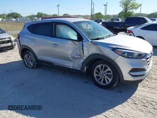 2018 Hyundai Tucson SE z VIN KM8J2CA46JU662933, wystawiony jako IAAI lot #41821298 z przebiegiem 37 985 mil mil oraz . Historia ofert i sprzedaży dostępna na DreamBid. Obrazek 1.