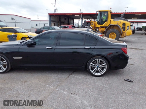 2014 BMW 7 Series 740Li with VIN WBAYE4C51ED138744, listed as a IAAI auction lot 42254213 with 116,157 mi miles and . Bid and sale history available at DreamBid. Image 14.