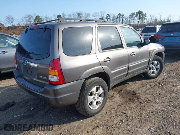2004 Mazda Tribute LX with VIN 4F2CZ941X4KM19302, listed as a IAAI auction lot 41791389 with 123,036 mi miles. Bid and sale history available at carsss.com. Image 4.