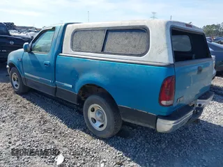 1997 Ford F-150 with VIN 1FTDF1768VNA92419, listed as a IAAI auction lot 41468196 with 91,943 mi miles and . Bid and sale history available at DreamBid. Image 3.