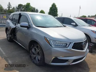 2020 Acura MDX with VIN 5J8YD3H39LL016466, listed as a IAAI auction lot 42376611 with 74,873 mi miles and . Bid and sale history available at DreamBid. Image 1.
