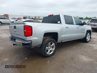 2016 Chevrolet Silverado 1500 LT with VIN 3GCPCREC1GG117881, listed as a IAAI auction lot 42106305 with 164,510 mi miles and . Bid and sale history available at DreamBid. Image 4.