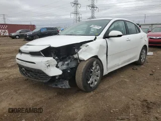2023 Kia Rio S z VIN 3KPA24AD1PE524072, wystawiony jako Copart lot #50667015 z przebiegiem 21 147 mil mil oraz Szkody całkowita. Historia ofert i sprzedaży dostępna na DreamBid. Obrazek 1.