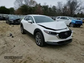 2021 Mazda CX-30 Select z VIN 3MVDMBBL1MM213629, wystawiony jako Copart lot #83900164 z przebiegiem 138 084 mil mil oraz Nie do naprawy • Non repairable. Historia ofert i sprzedaży dostępna na DreamBid. Obrazek 12.