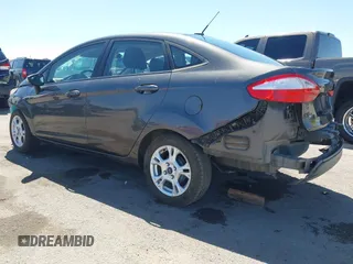 2015 Ford Fiesta SE with VIN 3FADP4BJ1FM217045, listed as a IAAI auction lot 42120444 with 119,207 mi miles and . Bid and sale history available at DreamBid. Image 3.
