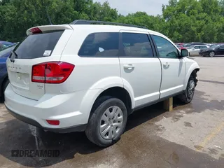 2019 Dodge Journey SE with VIN 3C4PDCBB6KT833777, listed as a IAAI auction lot 42411738 with 32,133 mi miles and . Bid and sale history available at DreamBid. Image 4.