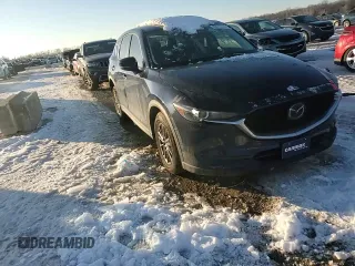 2021 Mazda CX-5 Touring with VIN JM3KFACM2M0329646, listed as a Copart auction lot 88217245 with 46,864 mi miles and Salvage Title. Bid and sale history available at carsss.com. Image 12.