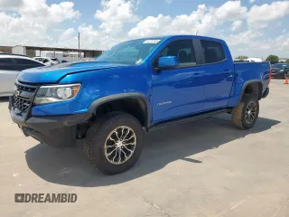 2020 Chevrolet Colorado 4WD ZR2 with VIN 1GCGTEEN6L1104160, listed as a Copart auction lot 64774765 with 70,683 mi miles and Salvage title. Bid and sale history available at DreamBid. Image 1.