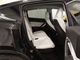2021 Tesla Model Y Long Range with VIN 5YJYGAEE5MF305655, listed as a IAAI auction lot 41860993 with 50,750 mi miles. Bid and sale history available at carsss.com. Image 8.