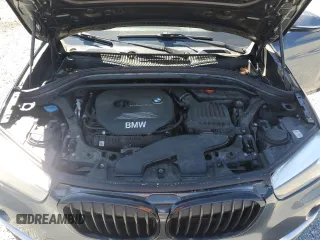 2018 BMW X1 sDrive28i z VIN WBXHU7C37J5H44758, wystawiony jako Copart lot #50888735 z przebiegiem 95 143 mil mil oraz Szkody całkowita. Historia ofert i sprzedaży dostępna na DreamBid. Obrazek 12.