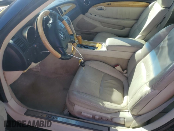 2002 Lexus SC 430 with VIN JTHFN48Y120027674, listed as a Copart auction lot 71220864 with 135,125 mi miles and Salvage Title. Bid and sale history available at DreamBid. Image 7.