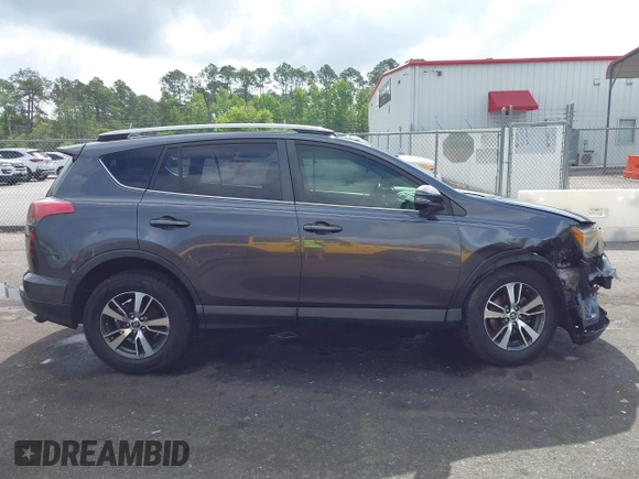 2018 Toyota RAV4 XLE z VIN JTMWFREV9JD132847, wystawiony jako IAAI lot #42108442 z przebiegiem 59 763 mil mil oraz . Historia ofert i sprzedaży dostępna na DreamBid. Obrazek 13.