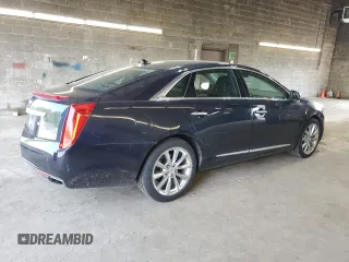 2013 Cadillac XTS Luxury with VIN 2G61P5S31D9140707, listed as a Copart auction lot 59008905 with 93,427 mi miles and Salvage title. Bid and sale history available at DreamBid. Image 3.