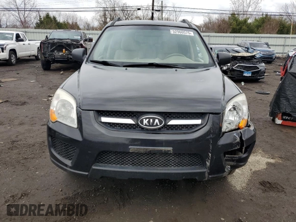 2009 Kia Sportage LX with VIN KNDJE723097622429, listed as a Copart auction lot 52960575 with 167,492 mi miles and Salvage Title. Bid and sale history available at carsss.com. Image 5.