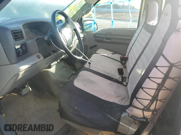 1999 Ford F-250 with VIN 1FDNF20L3XED36521, listed as a Copart auction lot 79300994 with 253,493 mi miles and Salvage title. Bid and sale history available at DreamBid. Image 7.