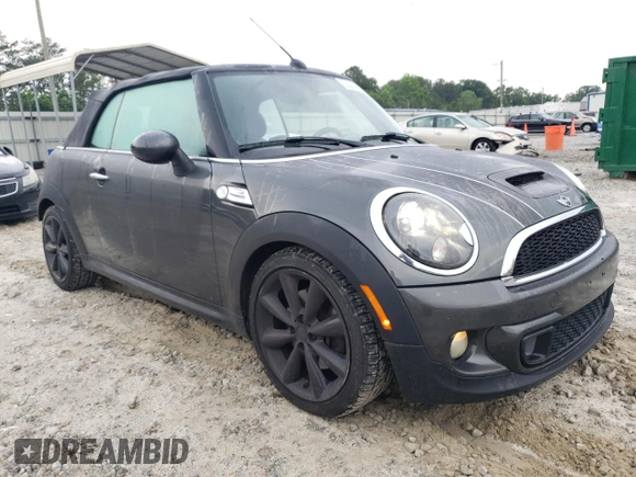 2013 MINI Convertible S с VIN WMWZP3C58DT550592, выставлен на аукционе Copart как лот 56250685 с пробегом 141 821 миль миль и Списание • Salvage title. История ставок и продаж доступна на DreamBid. Изображение 4.