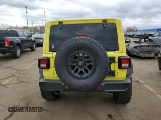 2022 Jeep Wrangler Unlimited High Tide with VIN 1C4HJXDG0NW204141, listed as a Copart auction lot 77570924 with 58,114 mi miles and Salvage Title. Bid and sale history available at DreamBid. Image 6.