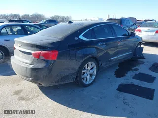 2014 Chevrolet Impala LTZ with VIN 2G1155S31E9105694, listed as a IAAI auction lot 41414595 with 128,828 mi miles. Bid and sale history available at carsss.com. Image 4.