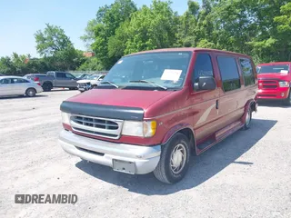 1999 Ford Econoline Cargo z VIN 1FDRE14W1XHA24974, wystawiony jako IAAI lot #42394228 z przebiegiem 138 473 mil mil oraz . Historia ofert i sprzedaży dostępna na DreamBid. Obrazek 2.