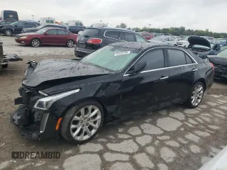 2014 Cadillac CTS Premium AWD with VIN 1G6AZ5S37E0130477, listed as a Copart auction lot 72440794 with 116,299 mi miles and Salvage Title. Bid and sale history available at DreamBid. Image 1.