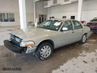 2005 Mercury Grand Marquis LS Premium with VIN 2MEFM75W65X644646, listed as a IAAI auction lot 41152301 with 70,400 mi miles. Bid and sale history available at carsss.com. Image 20.