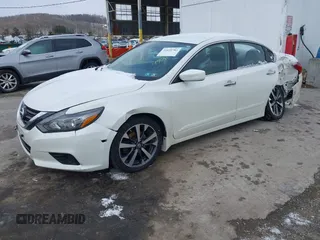 2017 Nissan Altima SV with VIN 1N4AL3AP7HC119737, listed as a IAAI auction lot 41630783 with 82,713 mi miles and . Bid and sale history available at DreamBid. Image 17.