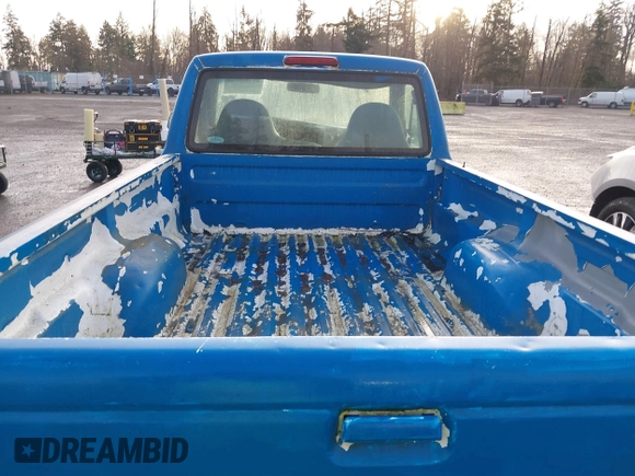 1999 Ford Ranger XL with VIN 1FTYR10V7XPB93324, listed as a IAAI auction lot 41762585 with 214,904 mi miles. Bid and sale history available at carsss.com. Image 8.
