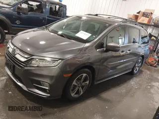 2018 Honda Odyssey Touring with VIN 5FNRL6H84JB041309, listed as a IAAI auction lot 42272247 with 90,371 mi miles and . Bid and sale history available at DreamBid. Image 19.