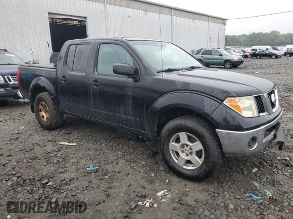 2005 Nissan Frontier LE with VIN 1N6AD07W05C445604, listed as a Copart auction lot 60499225 with 206,803 mi miles and Clean title. Bid and sale history available at DreamBid. Image 4.