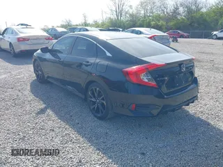 2019 Honda Civic Sport with VIN 19XFC2F86KE045495, listed as a IAAI auction lot 42074631 with 52,864 mi miles and . Bid and sale history available at DreamBid. Image 3.