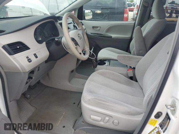2012 Toyota Sienna LE AAS with VIN 5TDKK3DC2CS217382, listed as a Copart auction lot 58067475 with 146,769 mi miles and Salvage title. Bid and sale history available at DreamBid. Image 7.