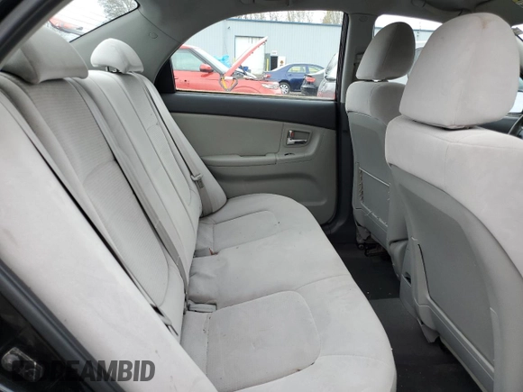 2009 Kia Spectra EX with VIN KNAFE222295664027, listed as a Copart auction lot 50788635 with 118,563 mi miles and Clean title. Bid and sale history available at DreamBid. Image 10.
