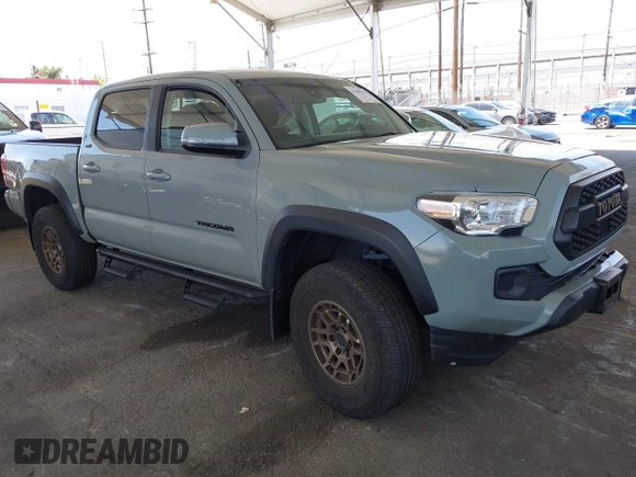 2022 Toyota Tacoma SR with VIN 3TMCZ5ANXNM479025, listed as a IAAI auction lot 42280363 with 29,650 mi miles and . Bid and sale history available at DreamBid. Image 1.
