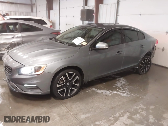 2017 Volvo S60 Dynamic with VIN YV140MTL0H2437537, listed as a IAAI auction lot 40801631 with 55,153 mi miles. Bid and sale history available at carsss.com. Image 2.