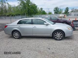 2007 Toyota Avalon XL z VIN 4T1BK36B77U198619, wystawiony jako IAAI lot #42204373 z przebiegiem 348 721 mil mil oraz . Historia ofert i sprzedaży dostępna na DreamBid. Obrazek 13.
