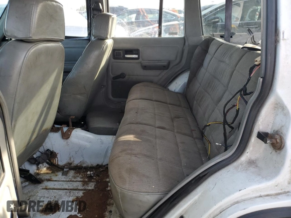 1994 Jeep Cherokee Sport with VIN 1J4FT68S0RL142185, listed as a Copart auction lot 80419344 with 172,294 mi miles and Salvage Title. Bid and sale history available at carsss.com. Image 11.